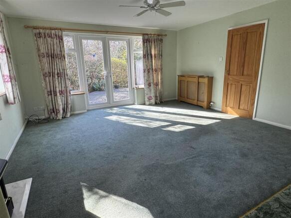 LIVING ROOM/BEDROOM FOUR: