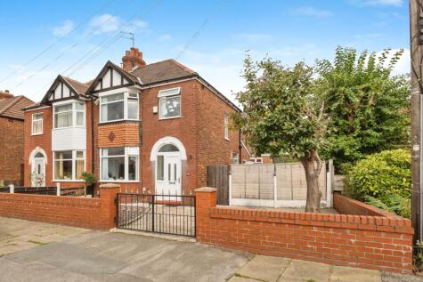 Town Lane, Denton, M34