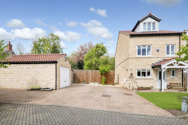 Exterior Front With Garage