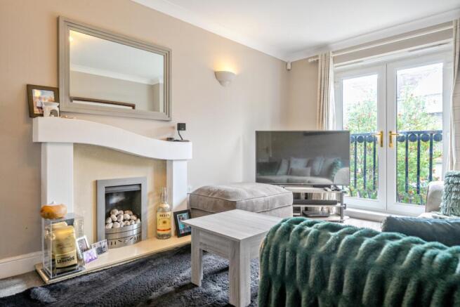 Living room with patio doors to Juliet Balcony