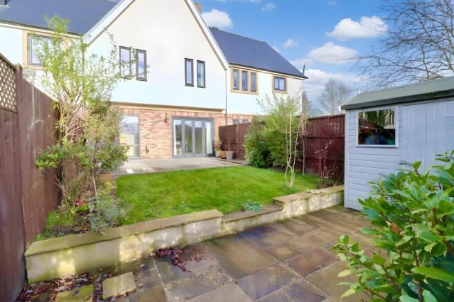 South-facing garden with composite decking