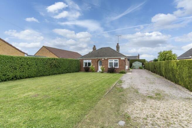 Front of house with driveway