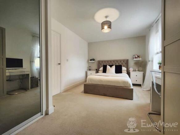 Master bedroom with built-in wardrobes