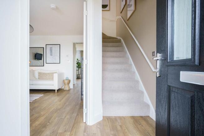 The entrance hall leads to the lounge