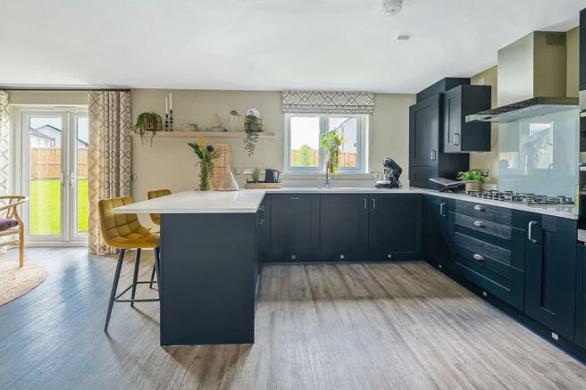 Spacious 3 sided kitchen with breakfast bar