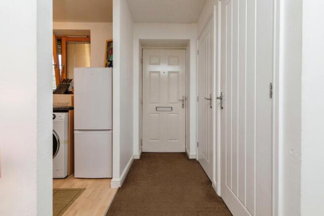 Hall - First Floor showing storage cupboards