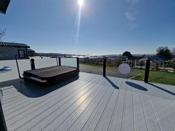 Property Frontage / Decking / Glass Balustrades / Hot Tub