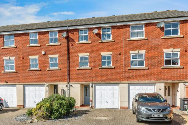 Front, Garage and Parking Space