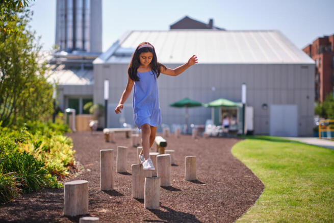 Girl playing in playground