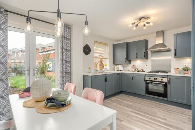 Internal view of the Maidstone open plan kitchen with dining area. 3 bed home.