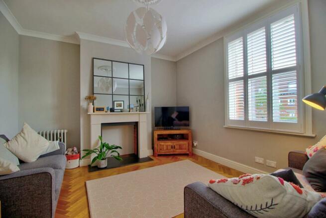 Living Room with herringbone flooring