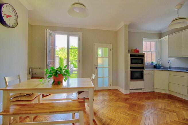 Open kitchen with doors to the garden