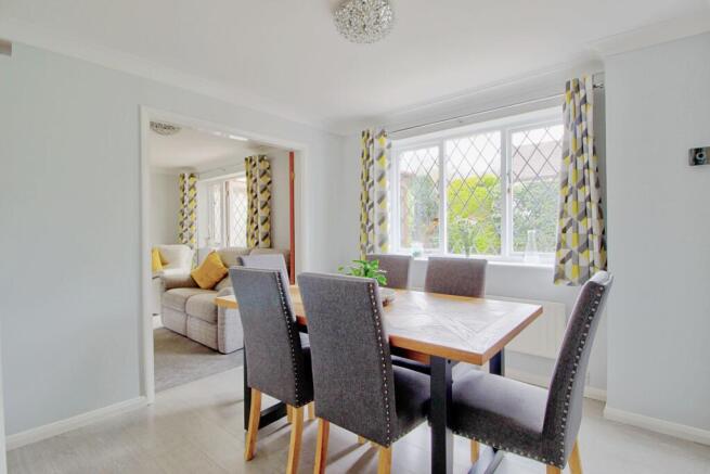 Double doors between dining & living rooms