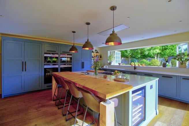 Kitchen with bi-fold doors and windows