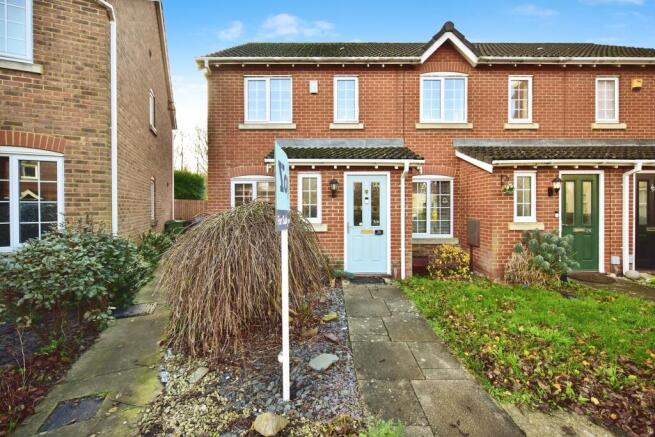Outside View Of The Property With Driveway Parking