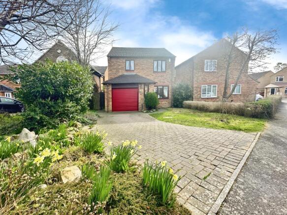 Outside View Of The Property With Driveway Parking
