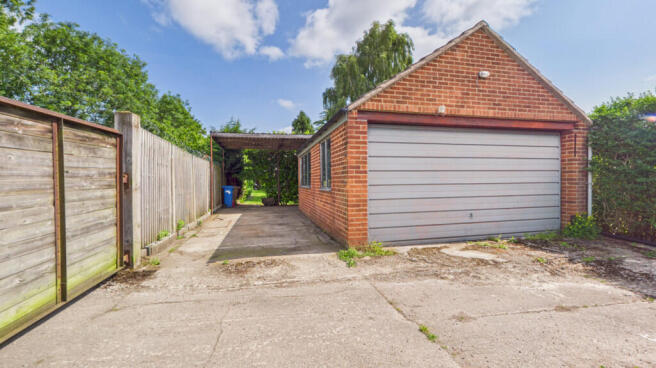 Rear driveway and...