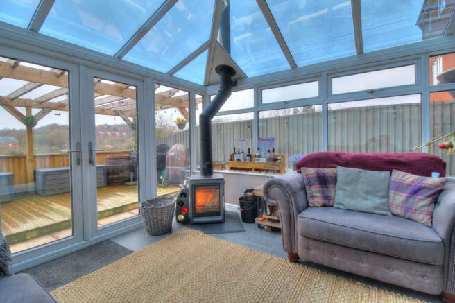 Conservatory with feature log burner