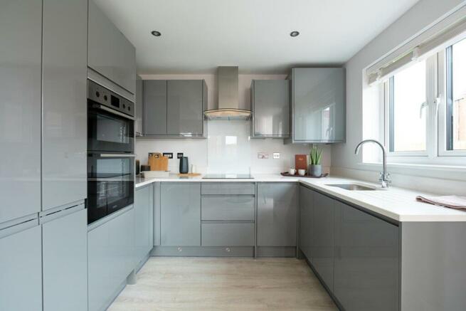 3-sided kitchen with ample worktop and storage space