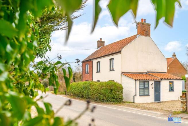 Front and Side Of Cottage