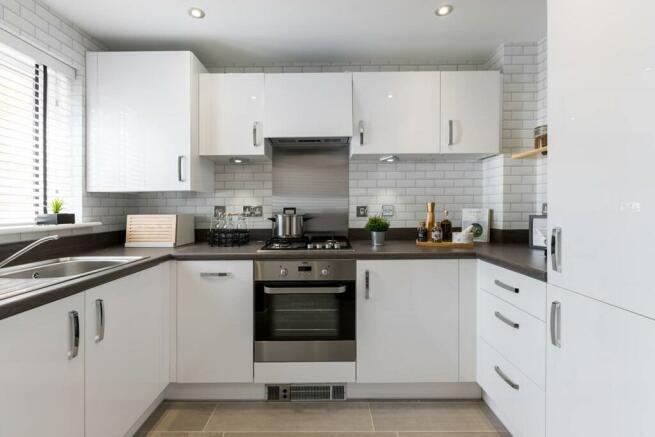 The Canford has a beautifully designed kitchen with ample cupboard space
