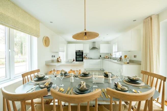 Open plan kitchen/dining area is the hub of this family home