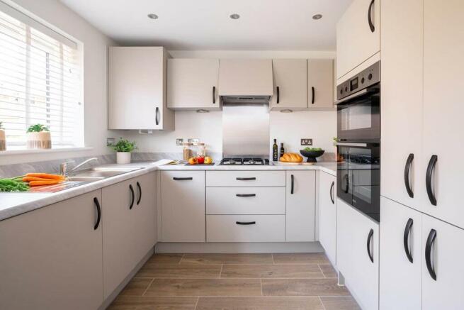 A bright and airy kitchen and dining area is perfect for entertaining