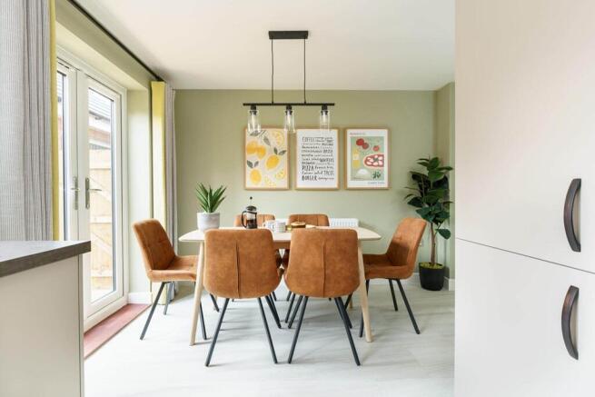 Double doors lead from the dining area to the garden perfect for alfresco dining