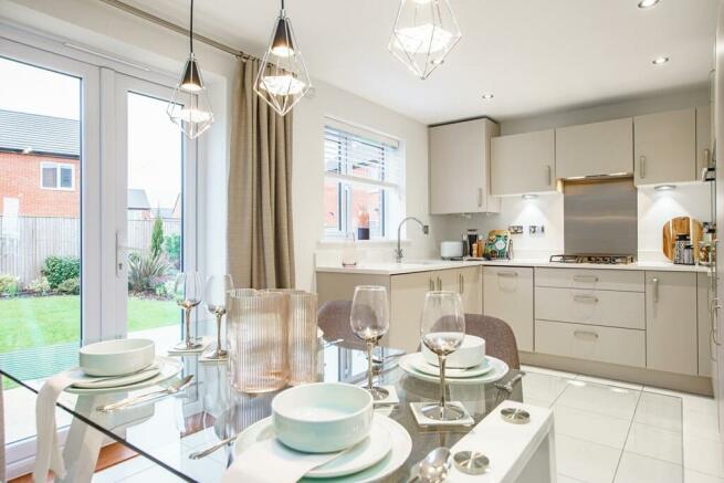 A spacious kitchen with dining area