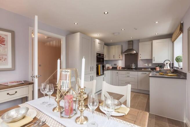 An open-plan kitchen/dining area perfect for entertaining