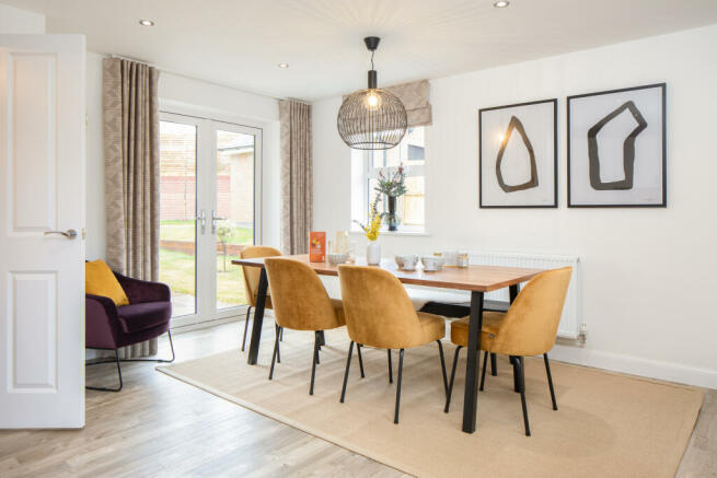 Open plan kitchen with dining area in the Alderney 4 bedroom home