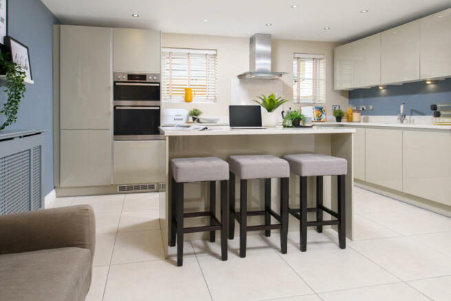 Kitchen with dining area inside 4 bedroom home at Elwick Gardens