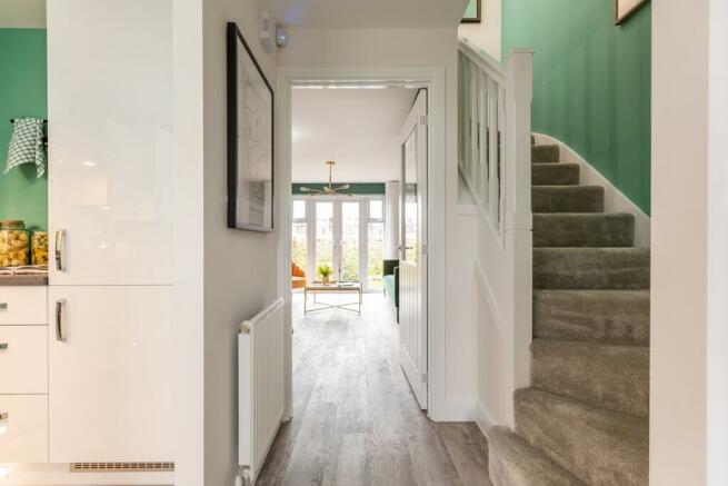 Bright hallway with under stair storage