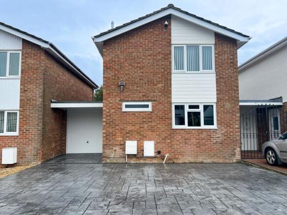 House Front with Driveway & Garage