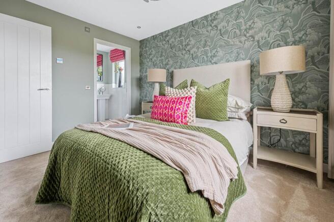 The main bedroom is a spacious retreat and enjoys a private en suite