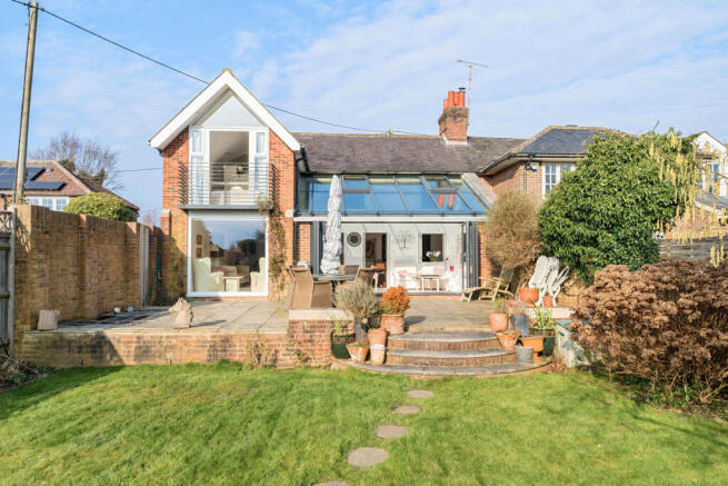 Rear elevation, terrace and garden