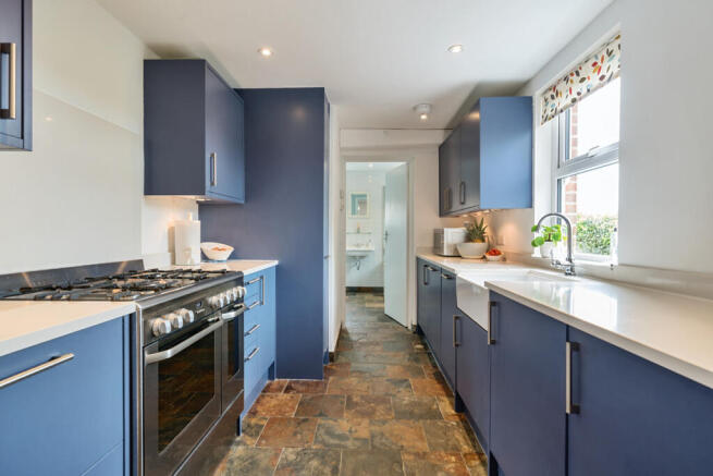 Fully fitted kitchen with integrated appliances and underfloor heating