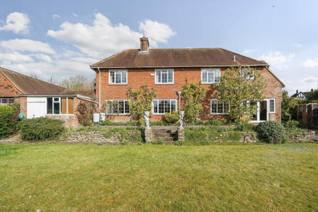 Rear elevation and private South facing rear garden and terrace