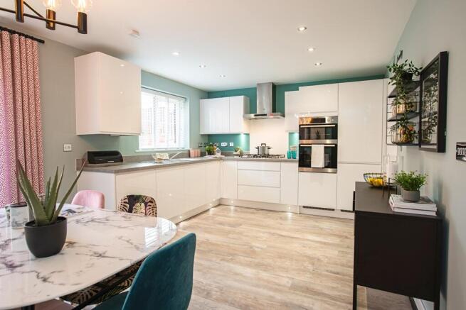 On open plan kitchen dining room is the hub of the home
