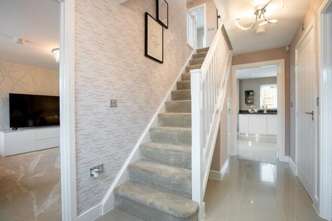The Manford has a bright and spacious hallway with under stairs storage