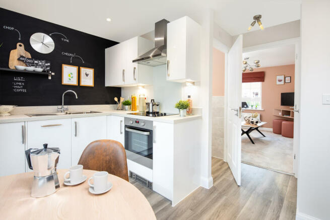 Kitchen with dining area in the Kenley 2 bedroom home