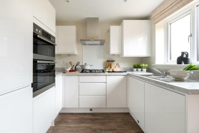 Beautifully designed modern kitchen with ample storage space