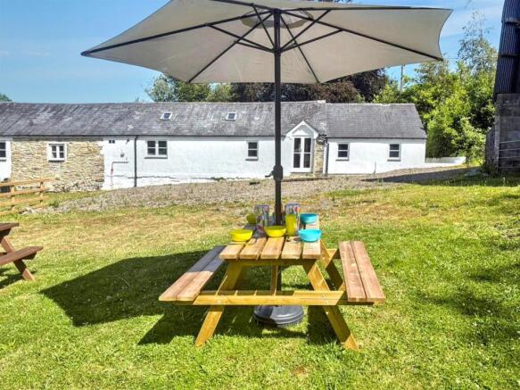 Front view of property and garden