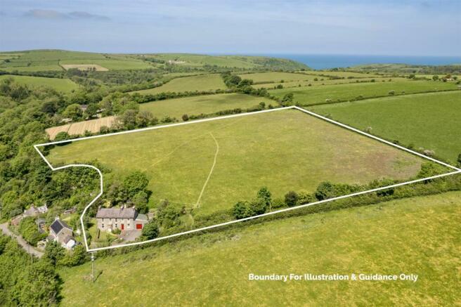 Aireal Photo of houses, land and views