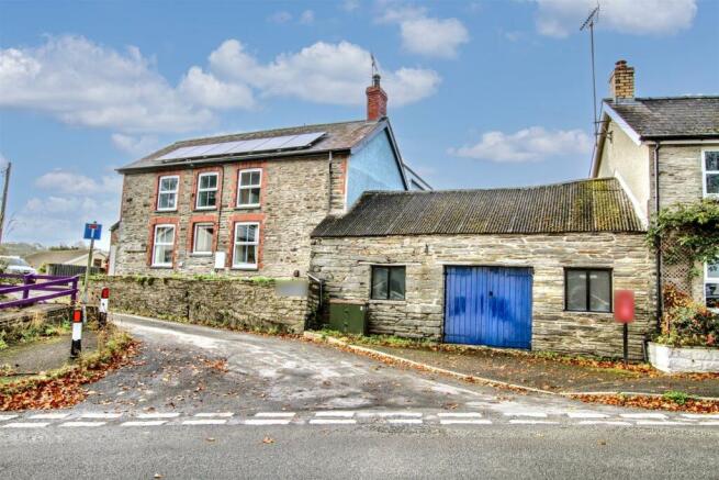 house and attached former smithy