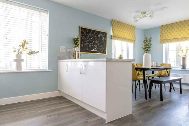 Beautifully designed kitchen with breakfast bar