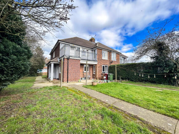Spacious Two-Bedroom Flat with Large Plot and Off