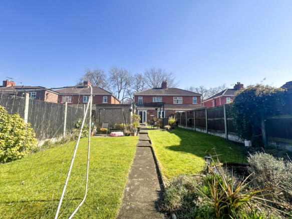 Charming Three-Bedroom Family Home with Modern Re