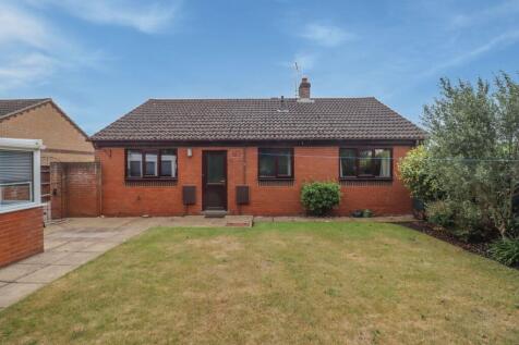 A Delightful Two-Bedroom, Detached Bungalow Perfectly Situated in the Charming Market Town of Holt