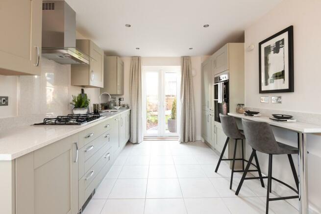 Designed with social living in mind, there's French doors from the kitchen too